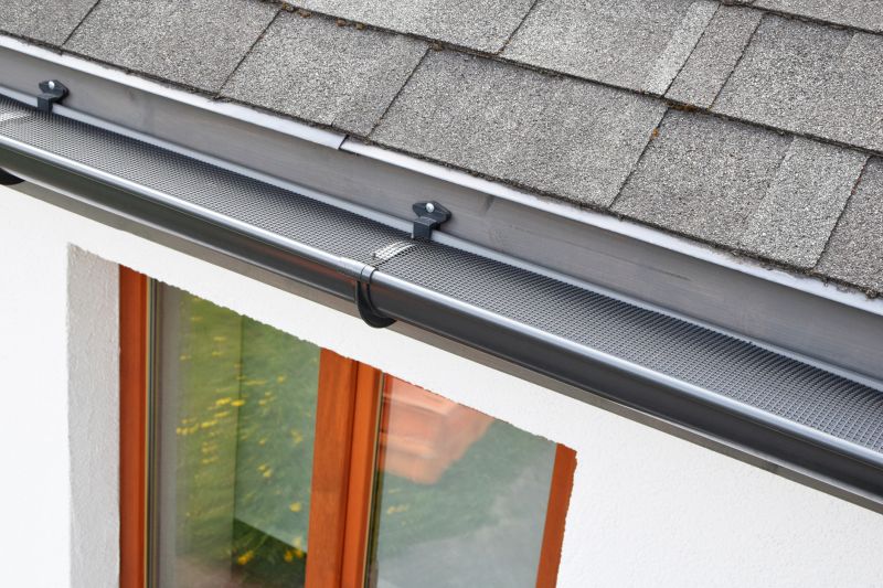 Gutter System with Protective Gutter Guards